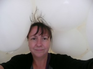 Julie Chamberlain amongst the balloons in St Ives